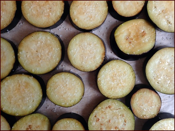 Salt applied to sliced eggplant.