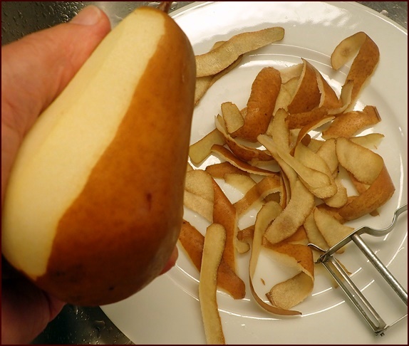 Peeling a pear.