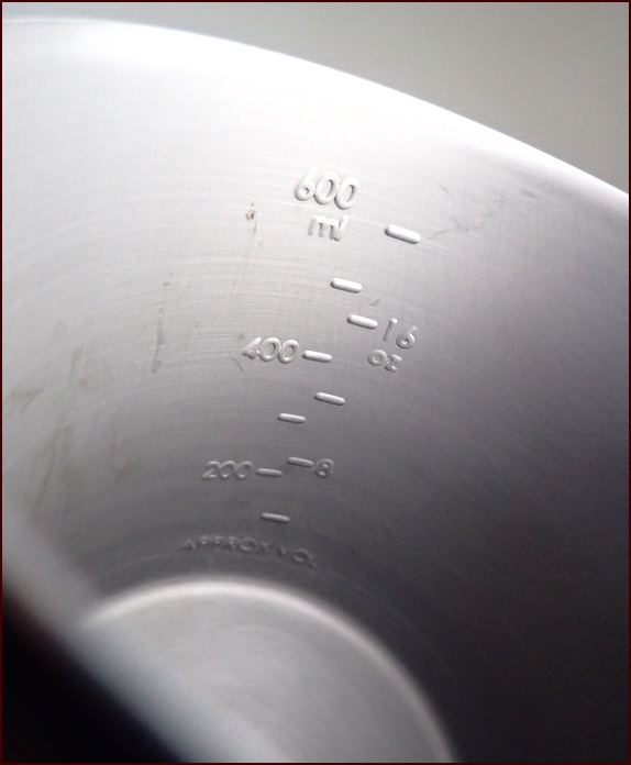 Volume measurements stamped into the GSI Minimalist Backpacking Pot.