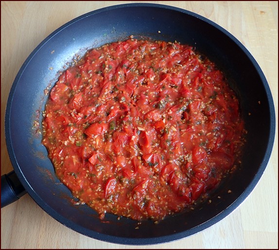 Cooking cherry tomatoes.