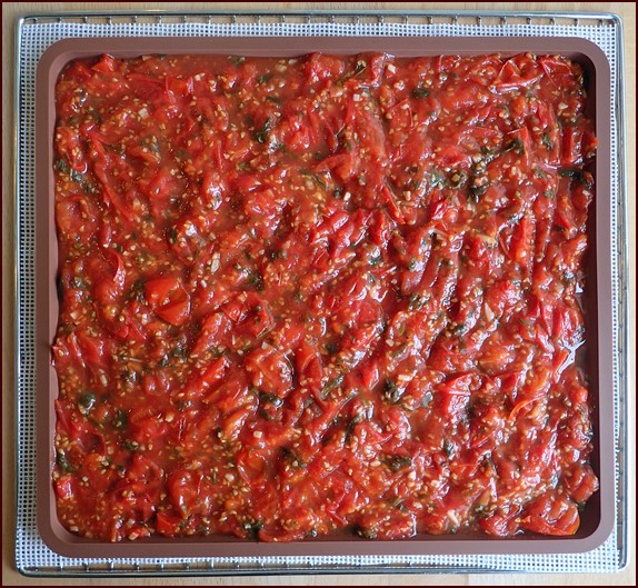 Stewed cherry tomatoes, one of the ingredients in dehydrated eggplant parmesan.