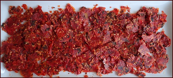 Dehydrated cooked tomatoes torn into pieces.